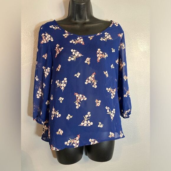 Charlotte Russe Tops - Charlotte Russe sheer blue floral open back blouse